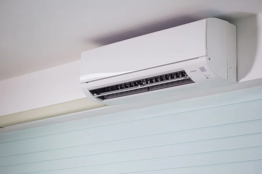 BreezaMax AC Price Guide: Cost, Performance, and Real Buyer Review Modern split air conditioner mounted on a bright living room wall